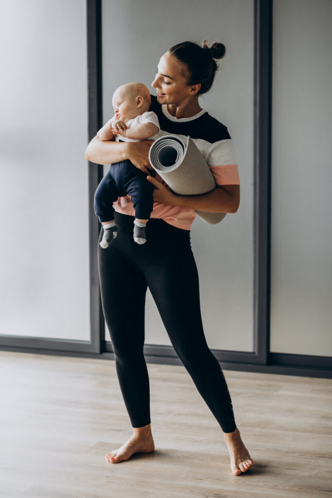 Nurse providing postnatal care to a mother in Dubai, offering support for new mothers and their babies